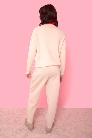 These athletic-inspired knitted pants are made from a wool and nylon blend, designed by L.F. Markey. The pants have an elastic waistband, large side pockets and a drawstring top. Style them with a casual crewneck sweatshirt or tee for a cool casual look.