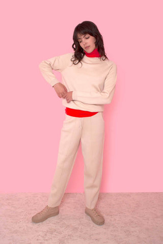 These athletic-inspired knitted pants are made from a wool and nylon blend, designed by L.F. Markey. The pants have an elastic waistband, large side pockets and a drawstring top. Style them with a casual crewneck sweatshirt or tee for a cool casual look.
