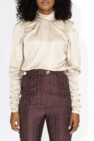 Nora Blouse is an elegant blush blouse with a little edge, that comes in the softest viscose. Style the Nora Blouse for the perfect everyday use with a pair of boyfriend jeans and sneaks or a skirt and a pair of high heels for the weekend. Designed by Birgitte Herskind.