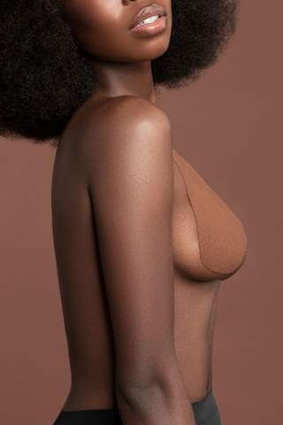 The Breast Lift Pads are the perfect backless and strapless solution to lift, shape, and support your breasts under any outfit. Made from 93% cotton they guarantee a very natural look & feel. Stretchy and breathable they feel like a second skin. The high quality and long-lasting adhesive make them sweat and water-proof.