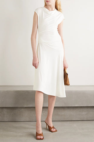 By Malene Birger's 'Aidia' dress is made from off-white stretch-crepe that's lightweight but still provides just enough coverage. It has an elegant cowl neckline and gentle gathering at the waist to create such a flattering drape. The floaty skirt moves beautifully as you walk.