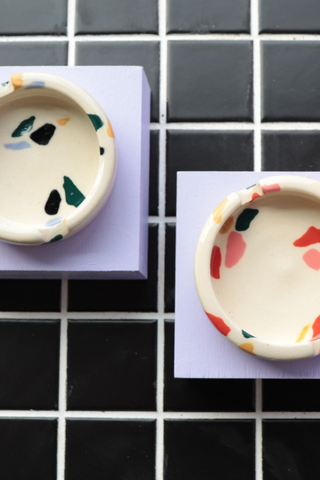 Bringing fresh shapes, cheerful details, and a vibrant wave of colour to any space, Nightshift Ceramic's mission is to make life a little brighter with fun ceramic housewares you can use everyday. This one-of-a-kind stoneware ashtray features a surface design inspired by terrazzo tile. Each is individually glazed and there will be delightful variations in pattern on all pieces. Also great as a jewelry dish or incense burner. Locally made in Toronto, Canada.