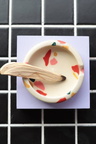 Bringing fresh shapes, cheerful details, and a vibrant wave of colour to any space, Nightshift Ceramic's mission is to make life a little brighter with fun ceramic housewares you can use everyday. This one-of-a-kind stoneware ashtray features a surface design inspired by terrazzo tile. Each is individually glazed and there will be delightful variations in pattern on all pieces. Also great as a jewelry dish or incense burner. Locally made in Toronto, Canada.
