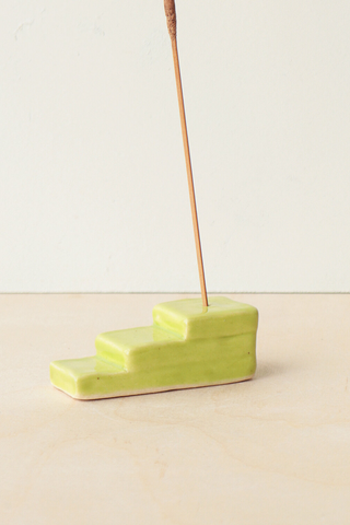 Bringing cheerful details and a vibrant wave of colour to any space, Nightshift Ceramic's mission is to make life a little brighter with fun ceramic housewares you can use everyday. This mini stoneware incense holder features descending steps in a fun lime green. Each is individually glazed and there will be delightful variations in pattern on all pieces. Locally made in Toronto, Canada. 