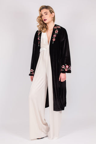 This Tula Rosa velvet beauty has landed. Features a beautiful floral embroidered detailing along the collar and sleeves. Wear it with a simple slip underneath for a sultry look.