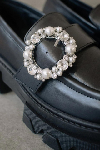 Your favourite loafers with a brilliant spin - literally. A gleaming diamond & pearl buckle to add a sparkle to your strut. Chunky soles for maximum comfort.