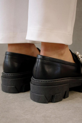Your favourite loafers with a brilliant spin - literally. A gleaming diamond & pearl buckle to add a sparkle to your strut. Chunky soles for maximum comfort.