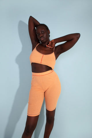 New for summer designed by L.F. Markey. The Hector Lounge Bralette features a fine ribbed pattern with a low scoop neck, thin adjustable straps and multi contrast stitching throughout. Made from 100% organic cotton, GOTS certified. Machine wash on a cool gentle cycle with similar colours. Worn with the Helios Bike Short