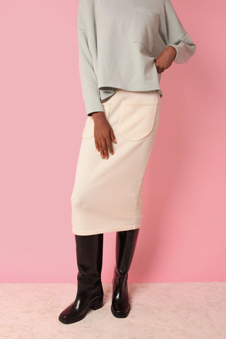 Oh so classic and versatile. Introducing the Wes Skirt by L.F. Markey. This mid-length fitted skirt features a close knit with an elasticated waist and front patch pockets, made from 100% RWS wool. Pair with the Kael Knit Jumper in off-white for the perfect matching set. 