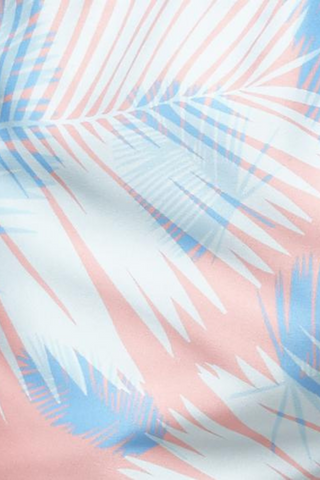 Stay groovy and keep calm in the exotic palms! The Tropicana overlaid palm print shorts are back with bolder pink and blue tones to make you look like the freshest fish in the water. Made from 100% super-soft quick drying polyester, these shorts will ensure that you have fun in the sun. Designed by Boardies. 