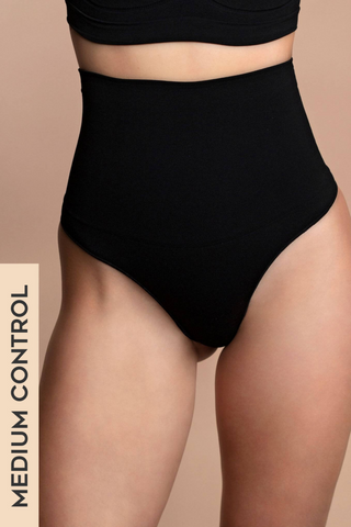 The Seamless High Waist Thong feels like second skin. With a medium core control high waist top and no stitching, this thong is flawless under almost anything! Designed by ByeBra, available in beige and black.