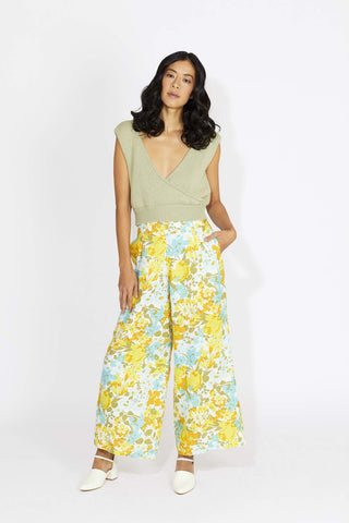 Super flattering and comfortable, this wide-leg pant is guaranteed to keep you airy + on-trend! The perfect high-waist pant to pack for your tropical honeymoon. Designed by Faithful featuring an exclusive handmade print made from 100% linen. 