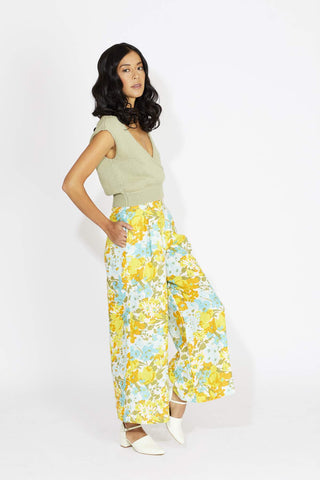 Super flattering and comfortable, this wide-leg pant is guaranteed to keep you airy + on-trend! The perfect high-waist pant to pack for your tropical honeymoon. Designed by Faithful featuring an exclusive handmade print made from 100% linen. 