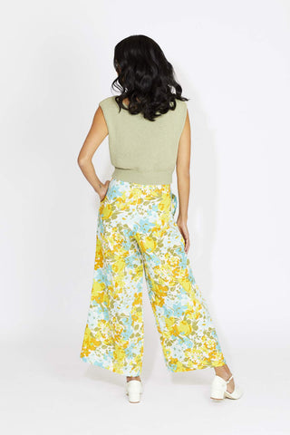 Super flattering and comfortable, this wide-leg pant is guaranteed to keep you airy + on-trend! The perfect high-waist pant to pack for your tropical honeymoon. Designed by Faithful featuring an exclusive handmade print made from 100% linen. 