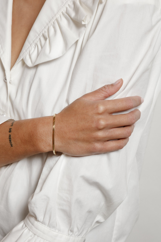 Designed by Wolf Circus. 7" 14k gold vermeil herringbone chain bracelet with lobster clasp. 