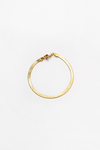 Designed by Wolf Circus. 7" 14k gold vermeil herringbone chain bracelet with lobster clasp. 