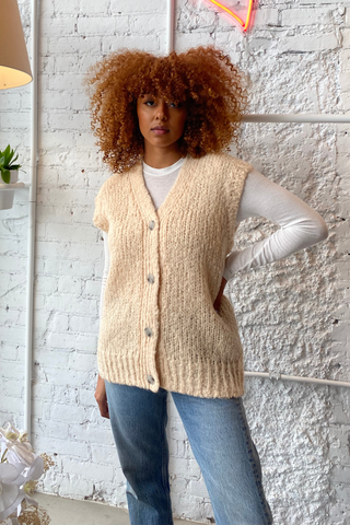 Designed by Just Female, we are loving the Erida chunky knit vest for Fall. Made in a warm alpaca blend, the knit is oversize with buttons in the front and v-neckline. Layer it open or closed over your outfit for a cool look on colder days. 