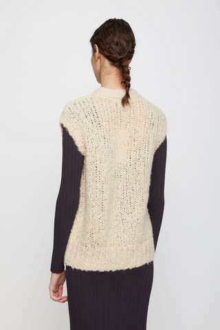 Designed by Just Female, we are loving the Erida chunky knit vest for Fall. Made in a warm alpaca blend, the knit is oversize with buttons in the front and v-neckline. Layer it open or closed over your outfit for a cool look on colder days. 