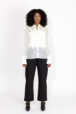 For the chic courthouse bride, there is this Chime shirt from Keepsake The Label. Pair it with a statement heel and you have a complete look. This bold statement blouse features gold metal buttons, and elastic loops closures. Made from a sexy sheer material with contract embroidery details. 