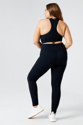 Kick some cardio butt with the Chase Legging. Crafted from breathable, moisture-wicking nylon spandex that works just as hard as you do. A flattering high waist smooths and refines, while stretchy, seamed fabric moves with your body so the only resistance you feel is your bands and weights. Includes a hidden waistband pocket perfect for keys. Designed by L*Space. 