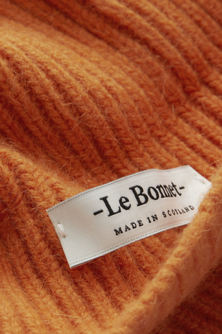 Introducing the best beanie ever made. Made from lambswool and Caregora in rich wine. This product features a Caregora certificate. The Caregora TM criteria of keeping and caring is founded on all these carefully judged guidelines, as to assure the quality of these valuable fibers and the highest standards of husbandry and animalcare. Sourced and manufactured in Scotland. Available in four fall hues. 