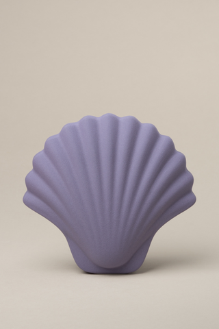 Bring the vacation home with our new Seashell Vases designed by Los Objetos Decorativos. Each piece is crafted by skilled ceramic artisans in Spain. This piece is the combination of 3D modeling and hand-crafted production. The rear vase allows putting your favourite floral arrangements. The perfect gift for yourself or someone in your universe. 
