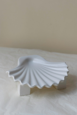 Bring the vacation home with our new Seashell Plate designed by Los Objetos Decorativos. A small dish made for jewellery, catch-all, and for incense or an ash tray. Each piece is crafted by skilled ceramic artisans in Spain. This piece is the combination of 3D modeling and hand-crafted production. The perfect gift for yourself or someone in your universe. 