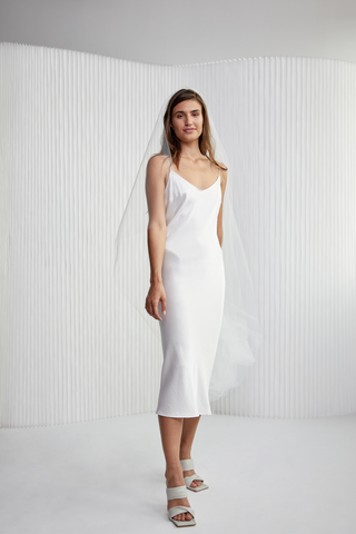 Looking for simple, but cool?! Try our Midi Slip Dress, our take on off-duty model wedding, shower, bachelorette, elopement or date night dress. She is Satin, effortless and hot! You will shine especially with a statement shoe.