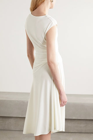 By Malene Birger's 'Aidia' dress is made from off-white stretch-crepe that's lightweight but still provides just enough coverage. It has an elegant cowl neckline and gentle gathering at the waist to create such a flattering drape. The floaty skirt moves beautifully as you walk.