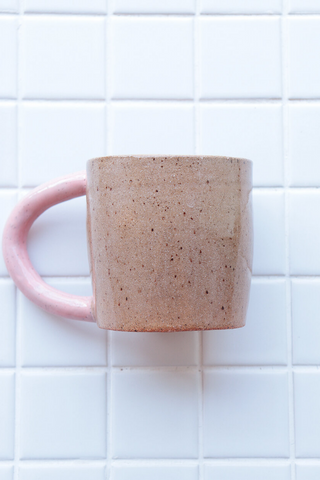 Bringing fresh shapes, cheerful details, and a vibrant wave of colour to any space, Nightshift Ceramic's mission is to make life a little brighter with fun ceramic housewares you can use everyday. The new everyday Colourblock Mug is finished in a clear glaze outside with a pop of colour inside. Available in both Rose and White! 