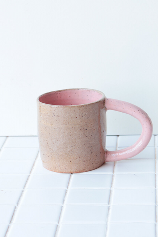 Bringing fresh shapes, cheerful details, and a vibrant wave of colour to any space, Nightshift Ceramic's mission is to make life a little brighter with fun ceramic housewares you can use everyday. The new everyday Colourblock Mug is finished in a clear glaze outside with a pop of colour inside. Available in both Rose and White! 