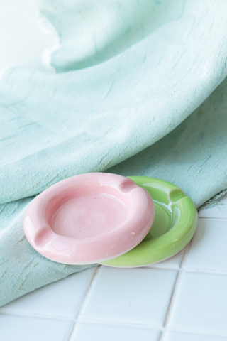 Bringing cheerful details and a vibrant wave of colour to any space, Nightshift Ceramic's mission is to make life a little brighter with fun ceramic housewares you can use everyday. This one-of-a-kind stoneware ashtray features rounded edges in a vivid lime colour. Each is individually glazed and there will be delightful variations in pattern on all pieces. Also great as a jewelry dish or incense burner. Locally made in Toronto, Canada. 