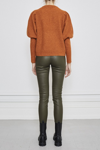  The perfect knit with a flare. Spice up your sweater life and cozy up with Notes Du Nord Rhona Blouse. Featuring a knit design in an earthy burnt orange tone. Made from a super soft wool and alpaca blend. 