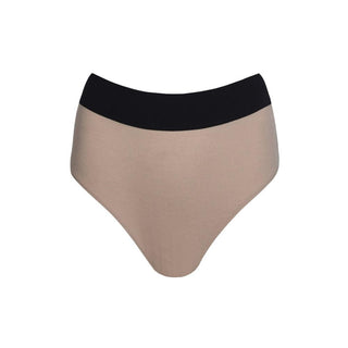 One of your most comfortable women's intimates collections from OW Intimates.  The Yulia Panty is designed in a soft ribbed material in a nude colour with a black band. We are obsessed with this high-waist panty with its daring 80's inspired look.