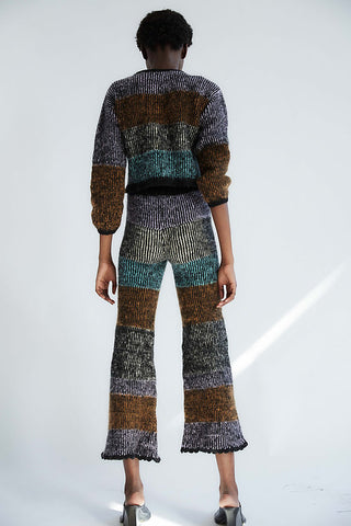 Tach Clothing based in Uruguay, crafts pieces featuring unique designs and bright coloured detailing that you won't find elsewhere. The Salma Pant is the perfect fit for the colder months ahead, pair these multi-coloured pants with the Chloe Cardigan for a matching set, made from an alpaca-wool blend. 