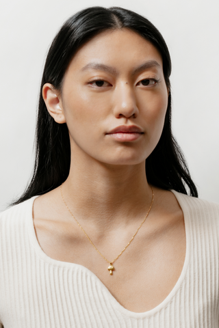 Designed by Wolf Circus. The funky Mushroom Charm Necklace is 18" in length, with a 14k gold plated bronze on gold-filled singapore chain. Made in Vancouver, Canada. 
