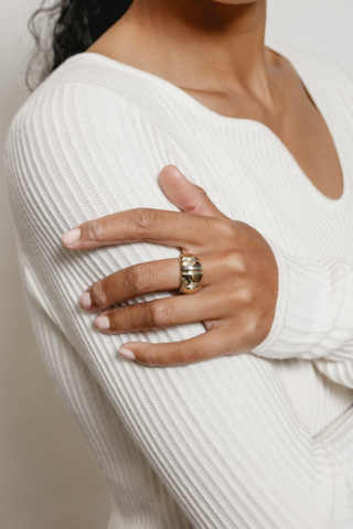 A plated sterling silver gold ring designed by Wolf Circus. The Imogen ring features an on-trend textured design. Pair with more rings from Wolf Circus to capture that layered look. The Imogen Ring is the perfect statement ring to keep your look stacked.