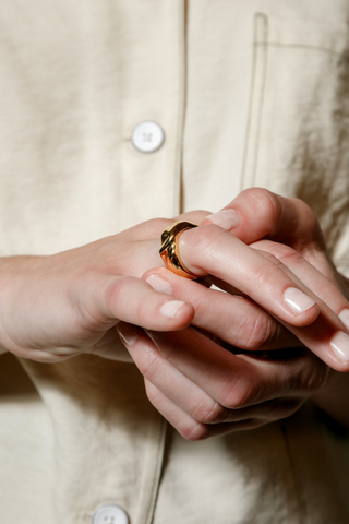 A 14k gold classic ring designed by Wolf Circus. The Aida ring features a gold-plated bronze textured wide stacking band. Pair with more rings from Wolf Circus to capture that layered look. The Aida Ring is the perfect statement ring to keep your look stacked.